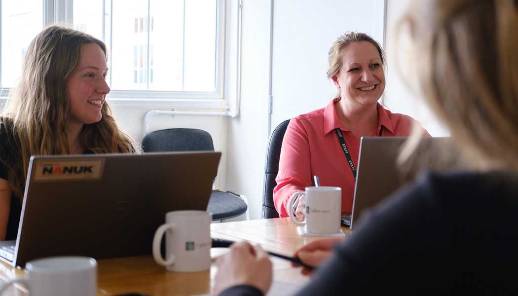 3 people at a meeting